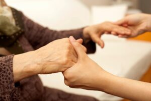 people holding hands receiving hope and depression therapy in Savannah, GA 