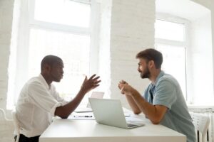 man meeting with therapist representing those who go to counseling for anxiety treatment in savannah, ga