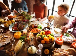 family sitting around thanksgiving table and relieving anxiety in savannah, ga with anxiety treatment