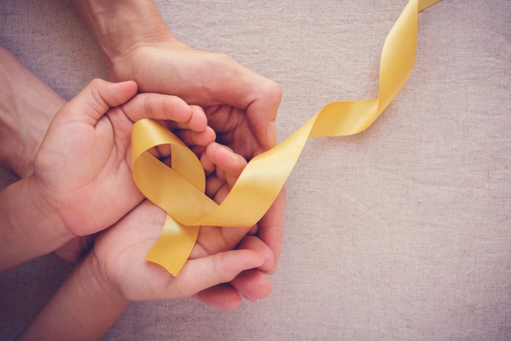 yellow ribbon representing CURE childhood cancer and receiving counseling during this time in Savannah, GA 